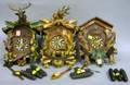 Three Carved and Painted Wood Cuckoo Clocks