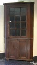 New England painted pine onepiece corner cupboard early 19th c