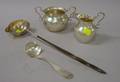 Howard  Co Sterling Silver Creamer and Sugar and a Sterling and a Coin Silver Ladle