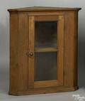 Pennsylvania cherry hanging corner cupboard early 19th c