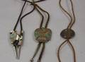 Three Southwest Native American Inlaid and Silver Bolo Ties