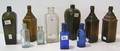 Ten glass bottles