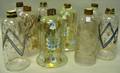 Nine Gilt and Enamel Decorated Colorless and Green Aqua Glass Candle Shades