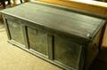 English Wrought Iron Mounted Black Painted Dovetail Constructed Paneled Oak Chest