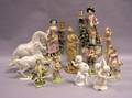 Twelve Assorted Continental Pottery and Porcelain Figures