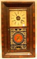 EN Welch Mfg Co Rosewood Veneer Ogee Mantel Clock