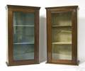 Two similar small mahogany hanging display cabinets