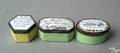 Three Battersea enamel pill boxes