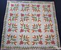 Vibrant Pennsylvania Dutch potted tulip quilt
