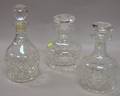 Three Colorless Cut Leaded Glass Decanters
