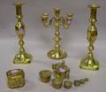 Pair of Brass Candlesticks a FiveLight Candelabra a Small Reticulated Brass Box and a Nest of Brass Weights