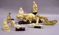 Nine Chinese and African Carved Ivory Figures