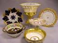 Seven German French and Asian Gilt and Floral Decorated Porcelain Table Items