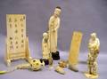 Eleven Asian Carved Ivory Figures and Table Items
