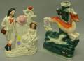 Two Staffordshire Polychrome Figural Vases