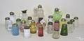 Nineteen assorted shakers to include colored glass