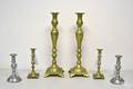 Two pairs of brass candlesticks