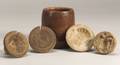 Four Carved Wooden Butter Molds and a Turned Burlwood Mortar