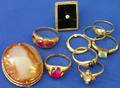 Nine Assorted Rings and a Hardstone Clip