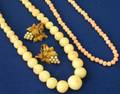 Gold and Pearl Earrings and Two Strands of Coral Beads