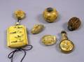 Asian Decorated Resin Inro with Netsuke Erotic Engraved Gourd Snuff a Carved Nutshell Snuff a Bone and Antler Snuff and Two Carved