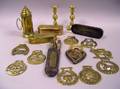 Two Brass Boxes Ten Horse Brasses a Pair of Brass Candlesticks a Lantern a Continental Brass and Metal Travel Cutlery Set and a Pa