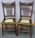 Pair of Late Victorian Pressed Oak Side Chairs with Caned Seats