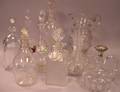 Eight Colorless Glass Decanters and a Pitcher