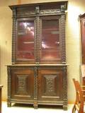 Late 19th Century Jacobeanstyle Carved Oak TwoDoor Book Cabinet