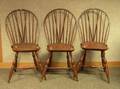 Set of Three Windsorstyle Red Stained Bowback Braceback Side Chairs