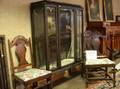 Early 20th Century Mahoganyfinished China Cabinet and a Set of Six 1930 Era Dining Chairs
