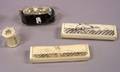 Four Modern Scrimshawstyle Decorated Bone and BoneMounted Boxes