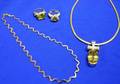 Four Modern Jewelry Items
