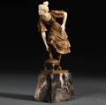 After Gotthilf Jaeger German 18711933 Bronze and Ivory Figure of a Woman Adjusting Her Shoe