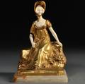 After Louis Sosson French fl 19051930 Bronze and Ivory Figure of a Seated Woman