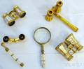 Four Motherofpearl Opera Glasses and a Magnifying Glass