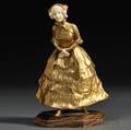 Continental School Late 19thEarly 20th Century Giltbronze and Ivory Figure of a Young Girl