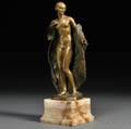 After Joe Descomps French 18691950 Bronze Figure of a Nude Woman with a Fur Coat