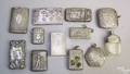 Twelve silver match safes
