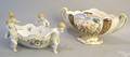 German porcelain centerpiece bowl with relief floral appliques and cupid supports