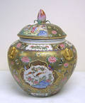Famille rose covered urn with blossom finial