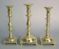 Three Spanish brass candlesticks 18th c