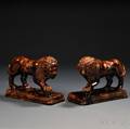 Pair of Rockinghamglazed Pottery Lions