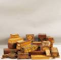 Twentysix Pyrographicdecorated and Pressed Wood Boxes and Five Hand Mirrors