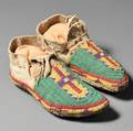 Pair of Lakota Beaded Buffalo Hide Moccasins