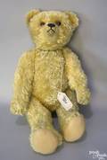 Musical Schuco YesNo bear with curly golden mohair