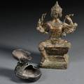 Buddhist Sculpture and Oil Lamp