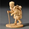 Ivory Okimono of a Man with a Cane