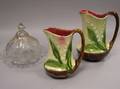 Two French Majolica Pitchers and a Victorian Art Glass Covered Cheese Dish