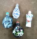 Four Assorted Asian Snuff Bottles